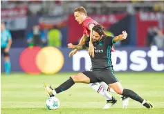 ??  ?? Real Madrid’s Spanish midfielder Isco (R) vies with Manchester United’s Serbian midfielder Nemanja Matic during the UEFA Super Cup football match between Real Madrid and Manchester United on August 8, 2017, at the Philip II Arena in Skopje. - AFP photo