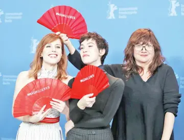  ??  ?? Coixet and actresses Greta Fernandez and Natalia de Molina pose during a photocall to promote ‘Elisa and Marcela’ at the 69th Berlinale Internatio­nal Film Festival in Berlin, Germany, on Wednesday. — Reuters photos