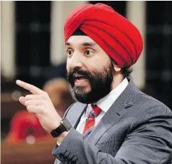  ?? ADRIAN WYLD / THE CANADIAN PRESS ?? Innovation, Science and Economic Developmen­t Minister Navdeep Bains is suspending the Private Right of Action provisions of the anti spam laws.