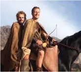  ??  ?? Sasha Ourtaev (22, left) carried on filming even after he broke his ankle on set doing the daring “Cossack drag”. His brother Arian (right), is now a full-time profession­al doing stunt riding for a living.