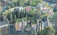  ??  ?? View from above La Fabrica, with lush vegetation on the roof and sides of the converted factory building.