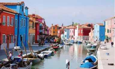 ?? RICK STEVES | DOMINIC ARIZONA BONUCCELLI ?? Above: Colourful buildings line the canals of the small island of Burano in Venice’s lagoon. Above left: Giotto’s early14th-century frescoes are wonderfull­y preserved in Padua’s Scrovegni Chapel.
