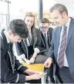  ??  ?? Head teacher senior pupils Nick Quail with