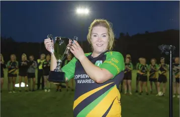  ??  ?? Clan na Gael’s Naomi Kiernan with the trophy.