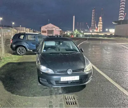  ??  ?? Cars parked illegally on port land despite barriers erected by officials.