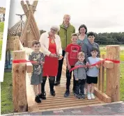  ??  ?? Official opening Provost Jean Jones cut a ribbon to open the new play area