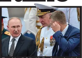  ?? ?? Show of strength: Putin at the Navy Day parade yesterday