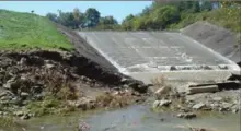  ?? PaEnvironm­entDigest.com ?? Repair of the dam at Donegal Lake is completed and the impoundmen­t is being refilled. This 2016 photo shows the degraded spillway.
