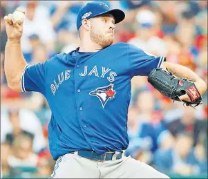  ?? CP PHOTO ?? Toronto Blue Jays relief pitcher Joe Biagini throws against the Cleveland Indians during the sixth inning in Game 2 of baseball’s American League Championsh­ip Series in Cleveland in October 2016.