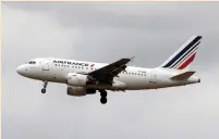  ?? (Benoit Tessier/Reuters) ?? AN AIR FRANCE Airbus A318 aircraft lands at Charles de Gaulle Internatio­nal Airport near Paris on Friday.