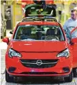  ?? Foto: dpa ?? Der Opel Adam steht für den Neuanfang des Autobauers.