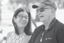  ?? JOE CAVARETTA/SOUTH FLORIDA SUN SENTINEL ?? WWII vet Timothy Maloney, 96, visits the garden of the Naval Air Station Fort Lauderdale Museum on Sunday with his daughter, Margaret-Ann Bolton, of Parkland.