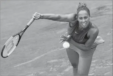  ?? CHRISTOPHE ENA/AP PHOTO ?? Madison Keys of the U.S. serves against Kazakhstan’s Yulia Putintseva during their quarterfin­al match in Paris on Tuesday, where Keys won in straight sets to reach the French Open semifinals.