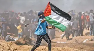  ?? AFP PHOTO / MOHAMMED ABED ?? Desde 30 de março, quando começaram os protestos, mais de 120 palestinos morreram por fogo israelense