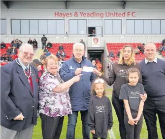  ??  ?? From left – Mayor’s consort Andrew Melvin, Mayor of Hillingdon Carol Melvin, club sponsor Tony Jenkins, Halo founder Alia Jones with Jaida, six and Nevaeh, eight, and Club Publicity Officer Rob Bitmead