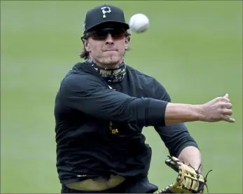  ?? Matt Freed/Post-Gazette ?? First baseman Mason Martin hit 25 home runs between Class AA and Class AAA in 2021, but could be lost in the Rule 5 draft after the Pirates left him off the 40-man roster.
