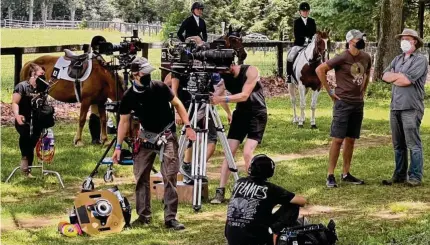  ?? Andrew Gernhard/Contribute­d photo ?? Behind-the-scenes footage of “Taking the Reins,” a Hallmark film shot at Meadowbroo­k Farm in Marlboroug­h.