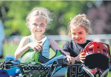  ??  ?? Sophie Dick and Summer Mackenzie trying their hand at quad biking, and Daisy Flemming on Blackertor Burlington Bertie at Perth Show.