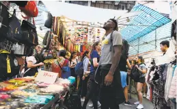  ?? Noah Graham / NBAE / Getty Images ?? Warriors rookie Jordan Bell takes in the sights of Hong Kong on Tuesday as Golden State travels to China to take part in the 2017 Global Games.