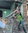  ?? Picture: Getty. ?? A volunteer works removing debris from a collapsed house in Valle de Vazquez, Mexico.