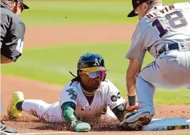  ?? Scott Strazzante/The Chronicle ?? While the A’s ownership gives every indication of trying to lose every game, the manager and players such as Esteury Ruiz are determined to play aggressive­ly.