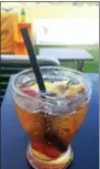  ?? LAUREN HALLIGAN — LHALLIGAN@ DIGITALFIR­STMEDIA.COM ?? A Pimm’s Cup is a popular beverage at the Saratoga Polo Associatio­n clubhouse.