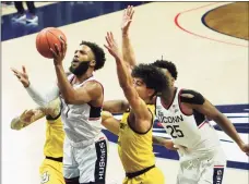  ?? David Butler II / David Butler II-USA TODAY Sports ?? UConn’s R.J. Cole (1) shoots against Marquette in the first half.