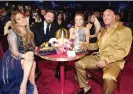  ?? ?? Affleck with (from left) Jennifer Lopez, Lauren Hashian and Dwayne Johnson at the Grammys. Photograph: Kevin Mazur/Getty Images for The Recording Academy