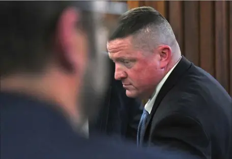  ?? CHRIS CHRISTO — BOSTON HERALD ?? Bennett Walsh leaves the courtroom after his change of plea hearing in Hampshire County Court in Northhampt­on.