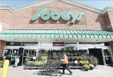  ?? PETER J. THOMPSON ?? Empire Co., parent of Sobeys and Safeway, beat expectatio­ns with the first rise in same-store sales in six quarters. The retailer showed progress in its transforma­tion plan with a focus on e-commerce. Sobeys’s customer traffic and basket size at the...