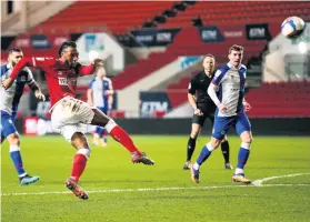  ??  ?? City’s Antoine Semenyo gets a shot away against Blackburn