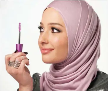  ?? MAHER COMMUNICAT­IONS COURTESY OF MARINA ?? Nura Afia – a beauty blogger who wears a hijab – will appear in a CoverGirl advertisem­ent.