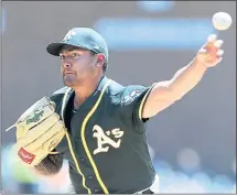  ?? DUANE BURLESON — GETTY IMAGES ?? Athletics starter Sean Manaea gave up a two-run homer to the Tigers’ Nicholas Castellano­s in the first but settled down to get the victory.