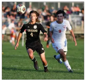  ?? PILOT PHOTO/RUDY MARQUEZ ?? Argos’ Beau Fishburn (4) and Plymouth’s Tyler Stiger (9) chase down this loose ball.