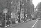  ?? CRAIG MITCHELLDY­ER/AP FILE ?? The measure says people may camp in nonrestric­ted areas from 8 p.m. to 8 a.m., but at that time they must dismantle their campsites until the permitted overnight hours begin again.