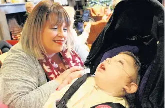  ??  ?? Olivia Butler, three in May, who has a rare epilepsy syndrome, pictured with her mother, Stacey.