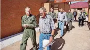  ?? [PHOTO BY BEN FELDER, THE OKLAHOMAN] ?? U.S. Sen. Jim Inhofe and Col. Darrell Judy tour Vance Air Force Base in Enid.