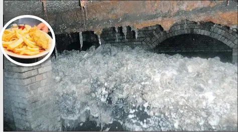  ??  ?? This photo released last week shows part of a “fatberg”, a mass of hardened fat, oil and baby wipes, measuring some 64 meters long, in the town of Sidmouth, England. Some are blaming good old English fish and chips for the problem.