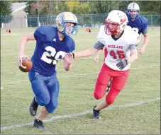  ?? Westside Eagle Observer/MIKE ECKELS ?? A Bulldog running back finds an opening around a Mustang defender as he makes a 60-yard run into the end zone during the Decatur-Midland junior high football contest at Bulldog Stadium in Decatur on Sept. 24. The junior high Bulldogs start their 2022 football season during the preseason Blue/Gold scrimmage in Decatur on Aug. 17.