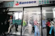  ?? FERNANDO LLANO AP ?? The former military officer submitted a fraudulent loan applicatio­n through Venezuela’s government currency agency to the nation’s central bank and Banesco Bank.