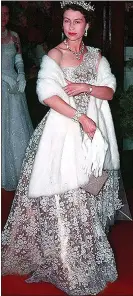  ??  ?? GOOD MEMORIES: The Queen in a stylish Norman Hartnell gown in 1954