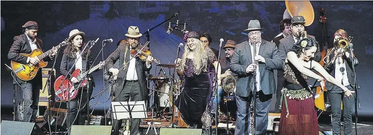  ??  ?? Violinist Cam Neufeld, third from left, will lead his Gadjo Collective for the 8th annual Road To Django concert Saturday at Fort Edmonton’s Capitol Theatre.