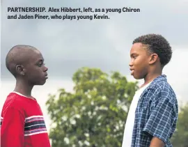  ??  ?? PARTNERSHI­P. Alex Hibbert, left, as a young Chiron and Jaden Piner, who plays young Kevin.