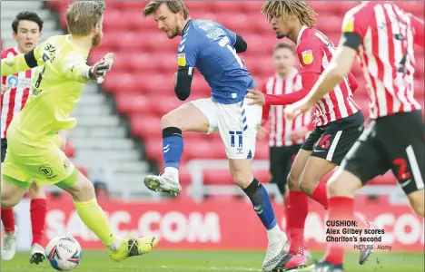  ?? PICTURE: Alamy ?? CUSHION:
Alex Gilbey scores Charlton’s second