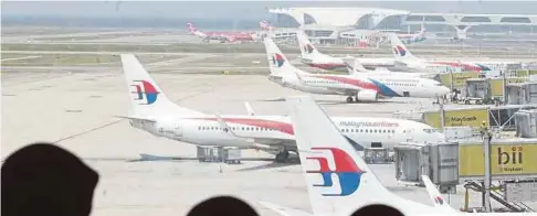  ??  ?? MALAYSIA Airlines berjaya kekal kedudukan dengan prestasi stabil bagi tempoh suku dikaji.