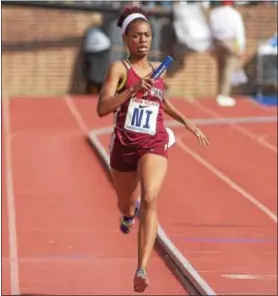  ?? PETE BANNAN — DIGITAL FIRST MEDIA ?? Terri Turner of Penn Wood is headed to Columbia University after finishing the season ranked first in the county in the 400 and second in both the 200 and 800, all while dealing with a severely sprained right ankle.