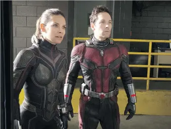  ??  ?? Hope Van Dyne, a.k.a. the Wasp, portrayed by Canadian actress Evangeline Lilly, joins Scott Lang, a.k.a. Ant-man, played by Paul Rudd, to save Hope’s mother from the Quantum Realm in Ant-man and the Wasp.