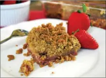  ?? PHOTO BY EMILY RYAN ?? Strawberry-rhubarb coffee cake makes a sweet breakfast or snack.