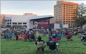  ?? CORNELIUS FROLIK / STAFF ?? The Levitt Pavilion Dayton shows were a hit, attracting about 25,000 people downtown during the venue’s inaugural season.