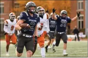  ?? TIM PHILLIS — FOR THE NEWS-HERALD ?? Case Western Reserve running back Gage Duesler runs for a touchdown against Waynesburg Oct. 21.